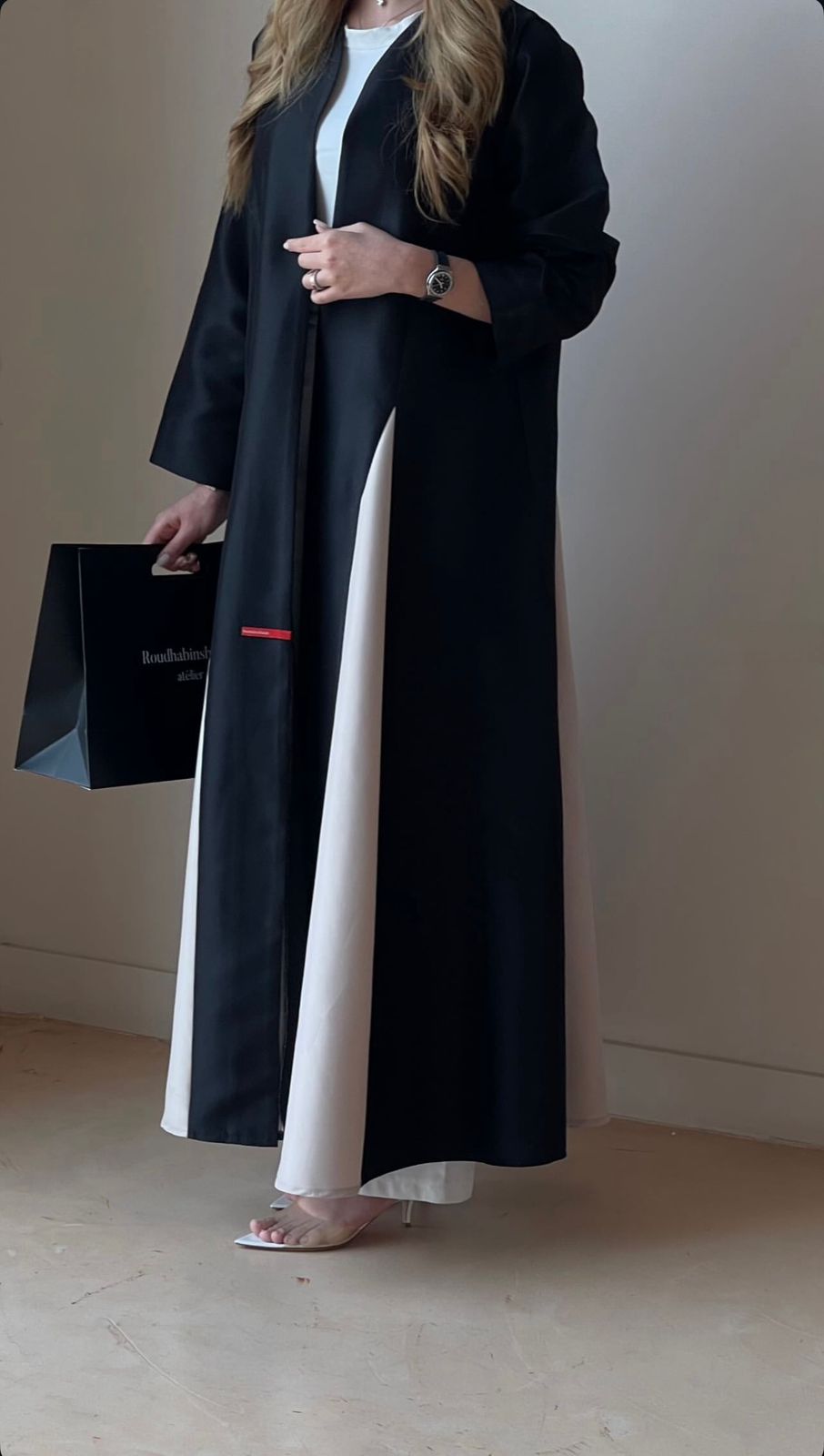 A stylish abaya crafted from luxurious satin fabric