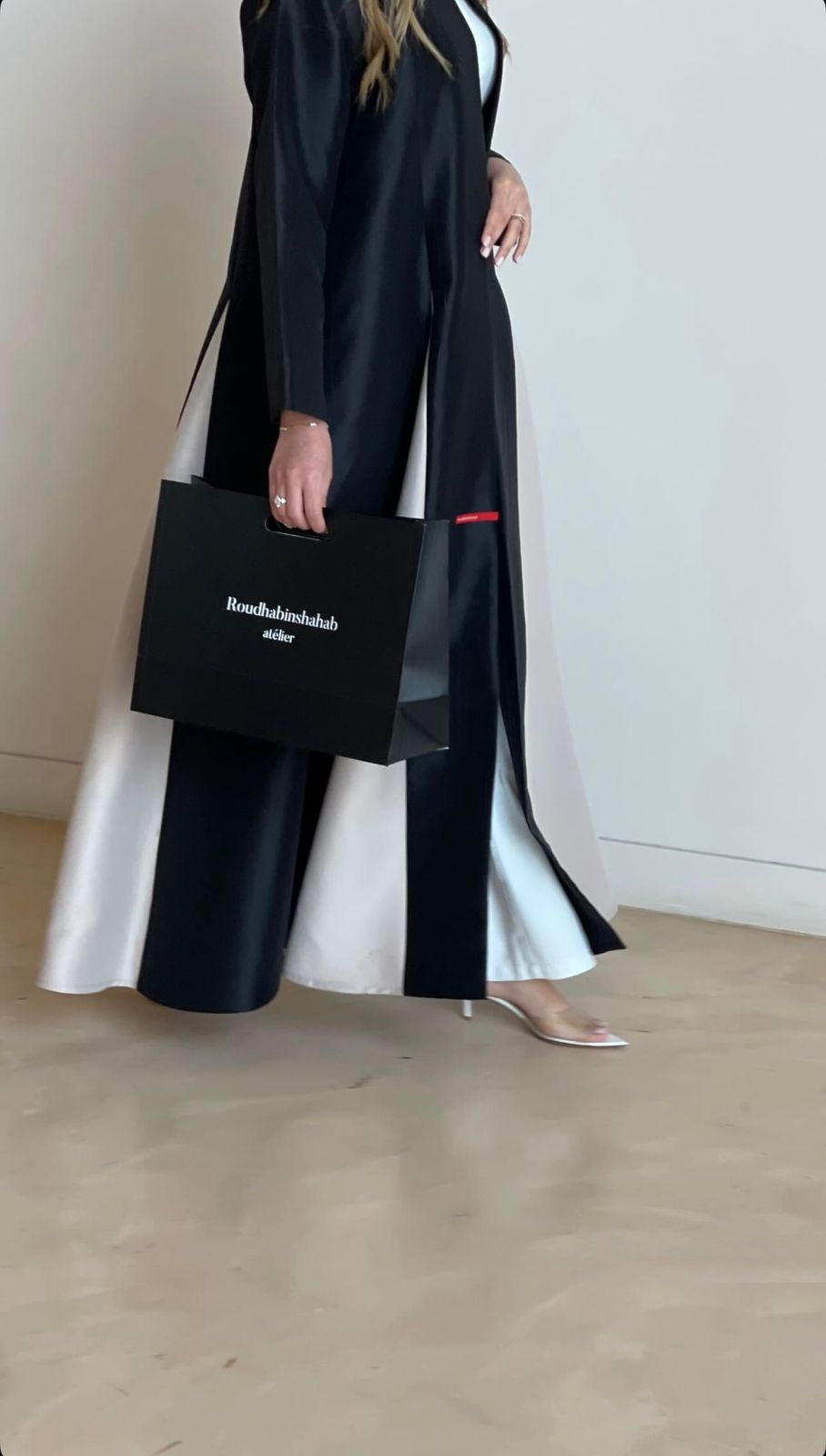 A stylish abaya crafted from luxurious satin fabric