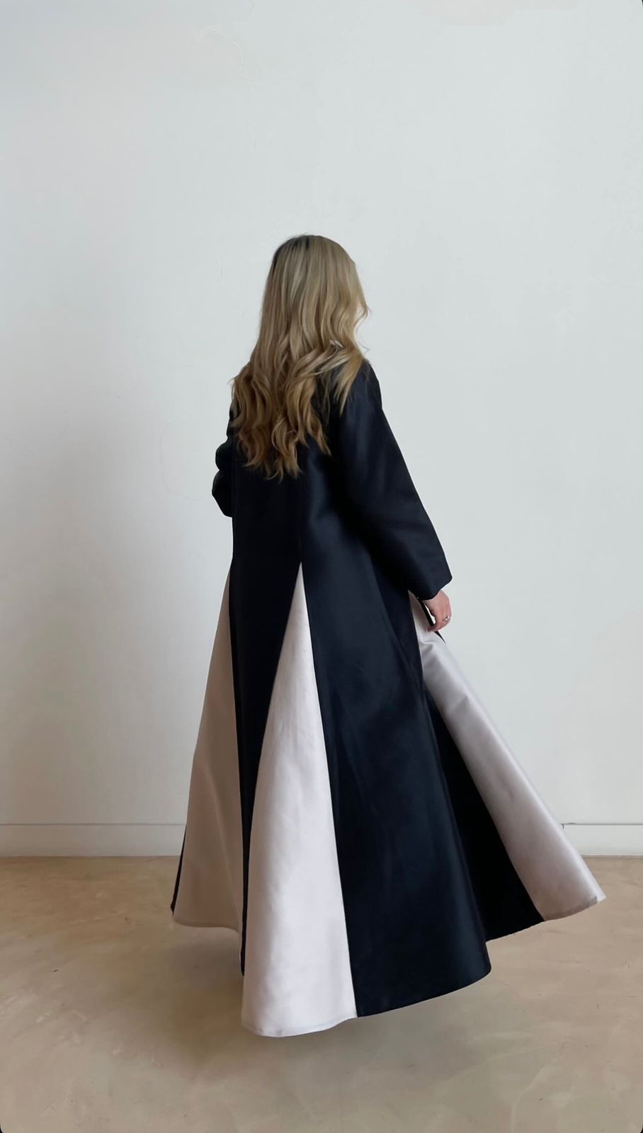 A stylish abaya crafted from luxurious satin fabric