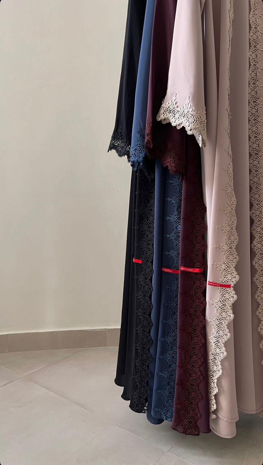 An elegant lace abaya crafted with soft