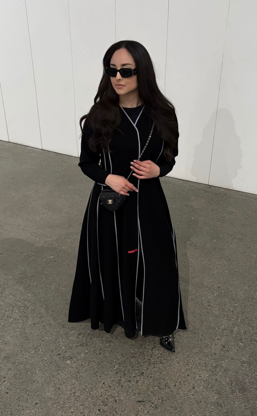 A line cut abaya with high quality of Barbie fabric with lines
