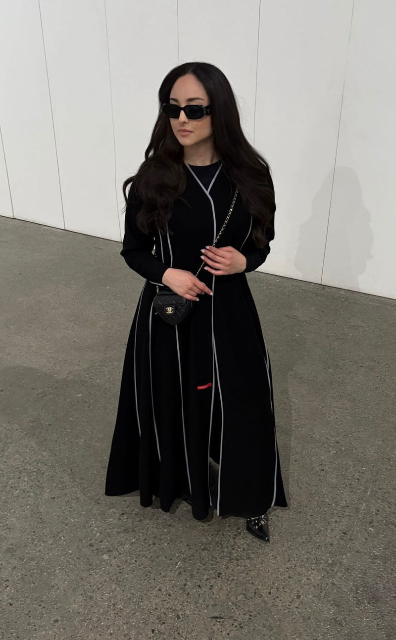 A line cut abaya with high quality of Barbie fabric with lines